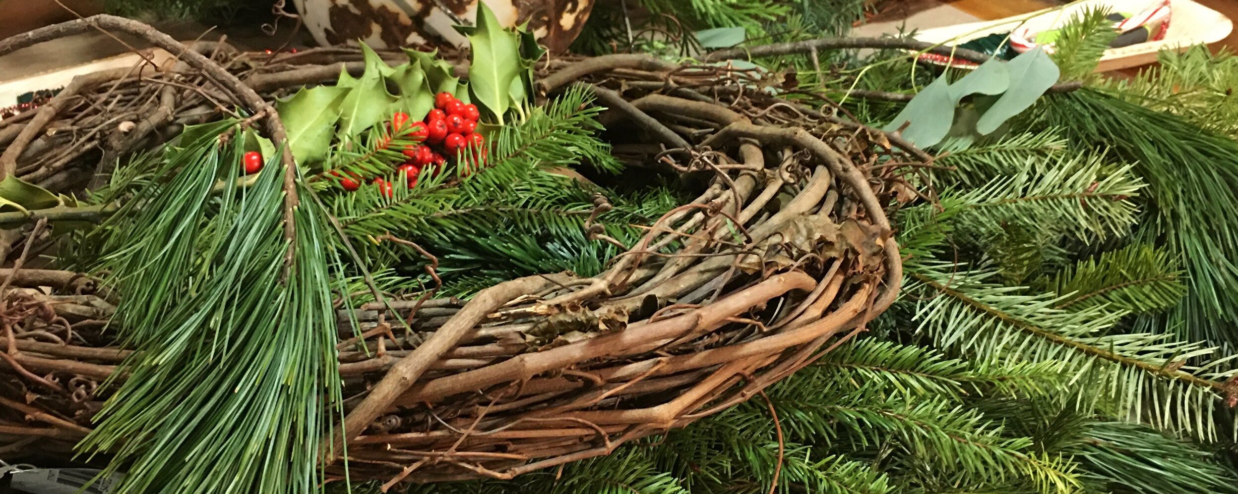 Grapevine wreath and various greenery